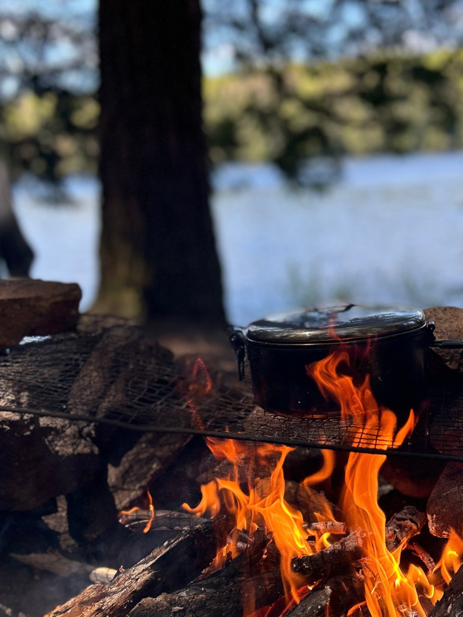 camping pot over campfire